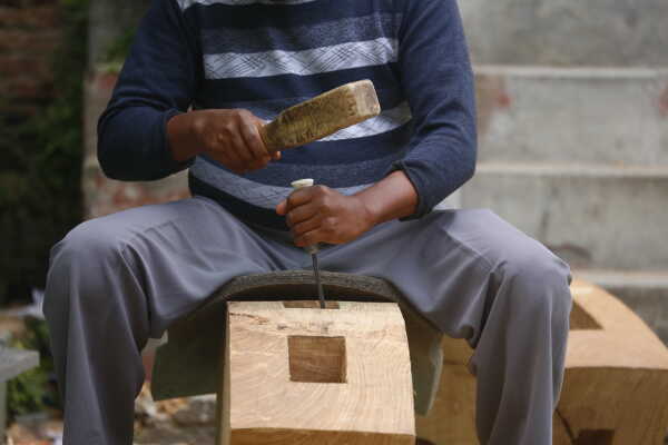 Daily Life in Nepal Reconstruction of Rato Machhindranath Chariot Wheel Underway
