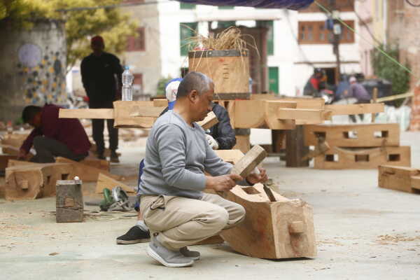 Daily Life in Nepal Reconstruction of Rato Machhindranath Chariot Wheel Underway