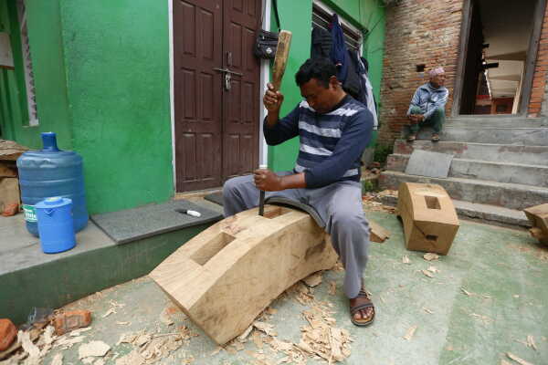 Daily Life in Nepal Reconstruction of Rato Machhindranath Chariot Wheel Underway