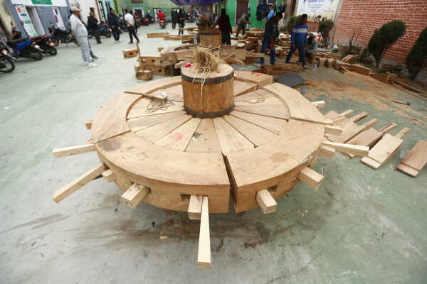 Daily Life in Nepal Reconstruction of Rato Machhindranath Chariot Wheel Underway