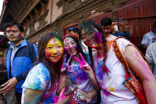 Foreign Tourists Join Holi Celebrations at Basantapur Durbar Square