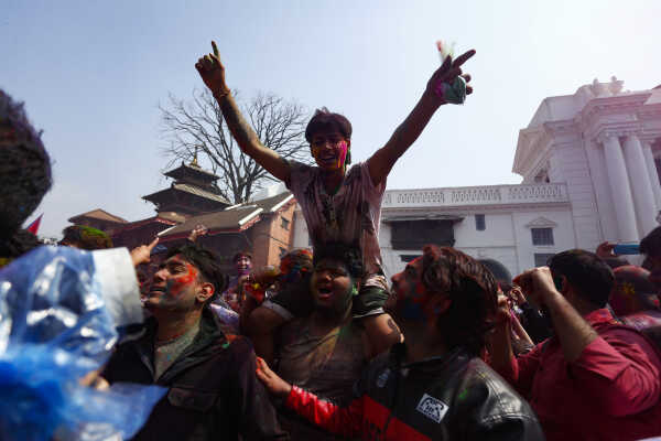 Foreign Tourists Join Holi Celebrations at Basantapur Durbar Square