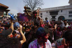 Foreign Tourists Join Holi Celebrations at Basantapur Durbar Square