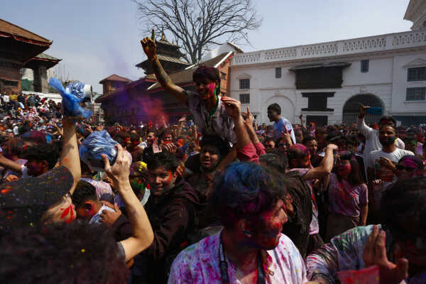 Foreign Tourists Join Holi Celebrations at Basantapur Durbar Square