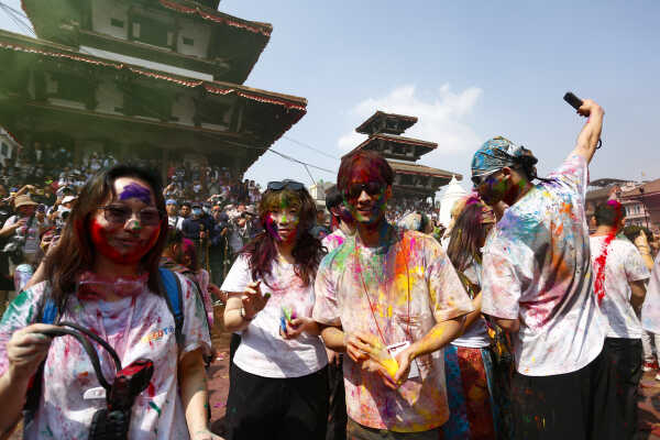 Foreign Tourists Join Holi Celebrations at Basantapur Durbar Square
