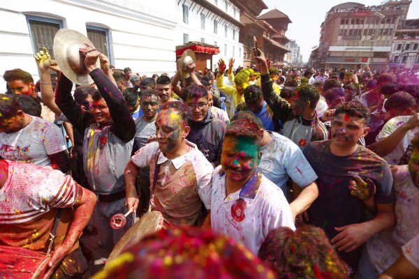 Foreign Tourists Join Holi Celebrations at Basantapur Durbar Square