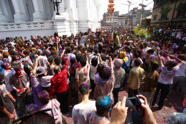 Foreign Tourists Join Holi Celebrations at Basantapur Durbar Square