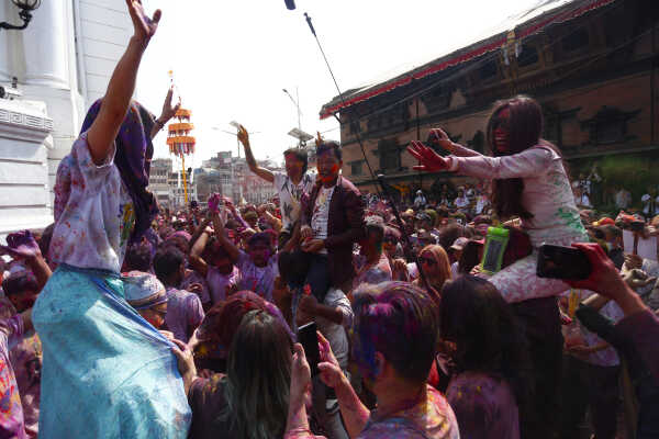 Foreign Tourists Join Holi Celebrations at Basantapur Durbar Square