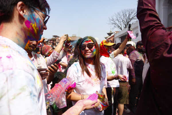 Foreign Tourists Join Holi Celebrations at Basantapur Durbar Square