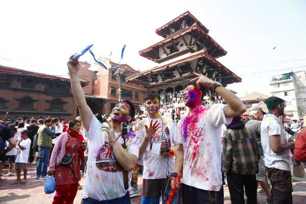 Foreign Tourists Join Holi Celebrations at Basantapur Durbar Square