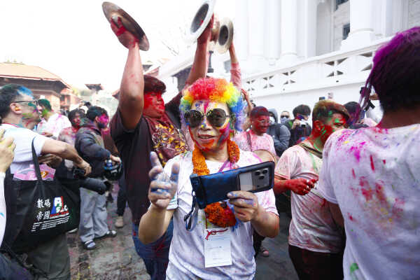 Foreign Tourists Join Holi Celebrations at Basantapur Durbar Square