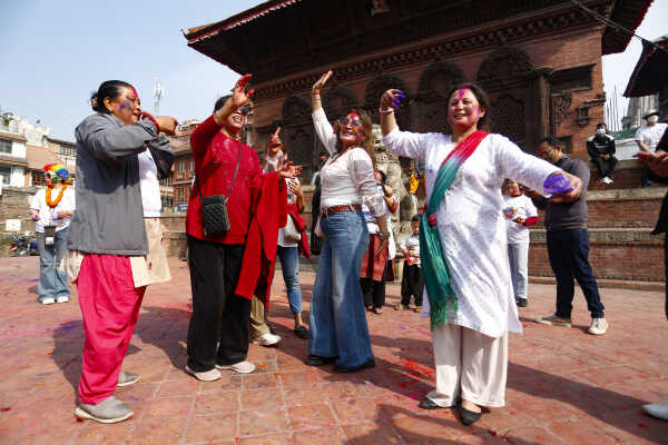 Foreign Tourists Join Holi Celebrations at Basantapur Durbar Square