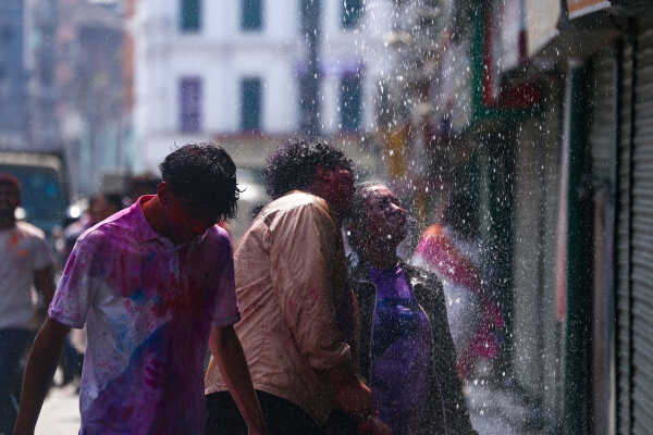 Foreign Tourists Join Holi Celebrations at Basantapur Durbar Square