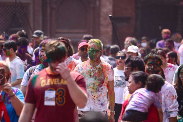 Foreign Tourists Join Holi Celebrations at Basantapur Durbar Square
