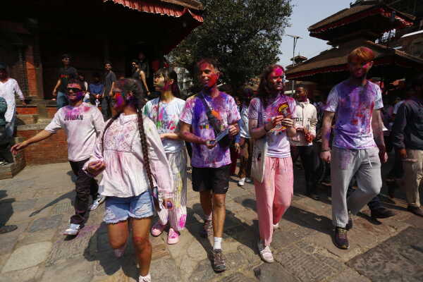 Foreign Tourists Join Holi Celebrations at Basantapur Durbar SquareForeign Tourists Join Holi Celebrations at Basantapur Durbar Square