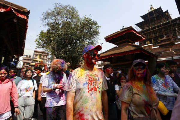 Foreign Tourists Join Holi Celebrations at Basantapur Durbar Square