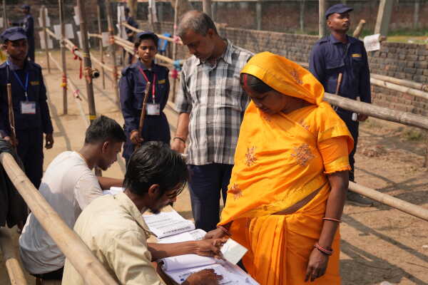 Voters Queue at Polling Station in Dhanusha During Nepal’s Election Day