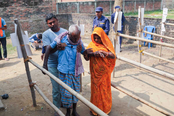 Voters Queue at Polling Station in Dhanusha During Nepal’s Election Day